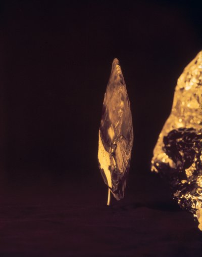 Knapped axe or spear head by Paleolithic